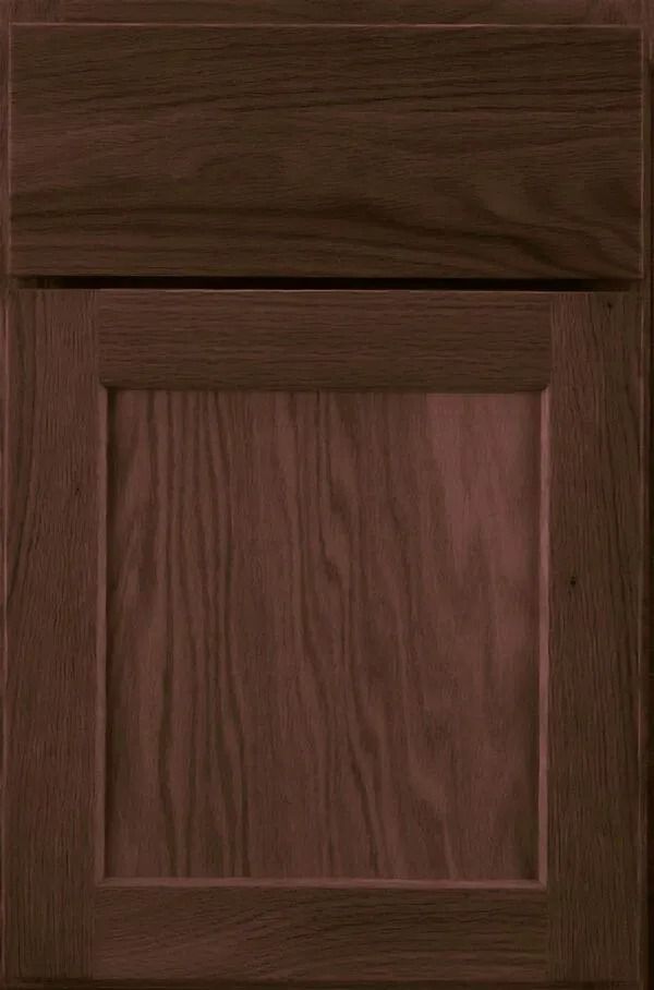 Dark brown wooden cabinet door with recessed panel.