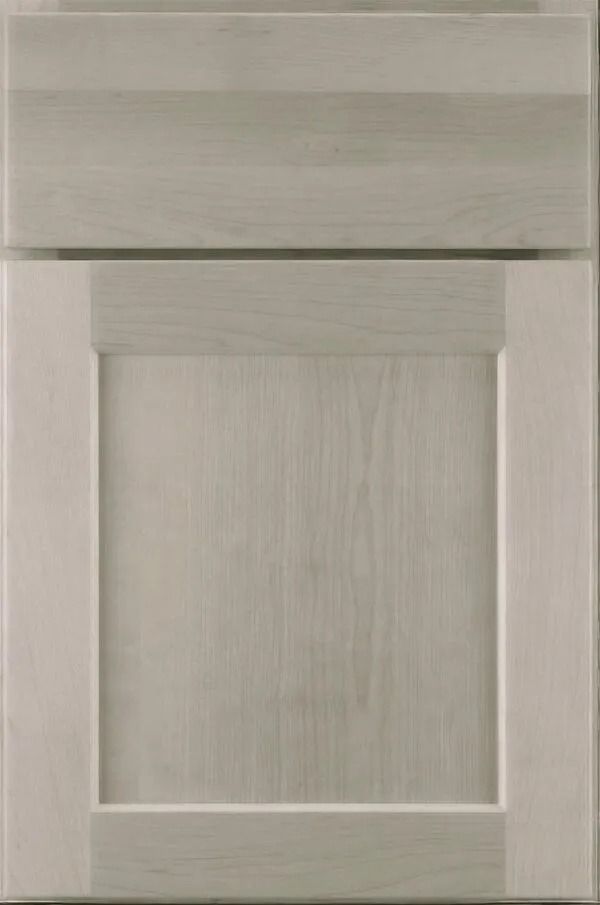 Gray wood kitchen cabinet door with recessed panel.
