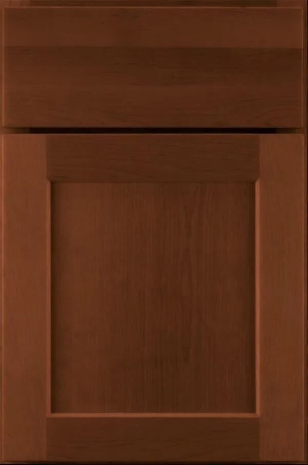 Brown wooden kitchen cabinet door with a framed inset panel.