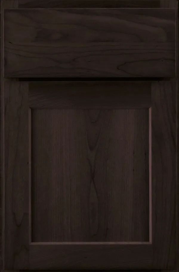 Dark brown wooden cabinet door with recessed panel.