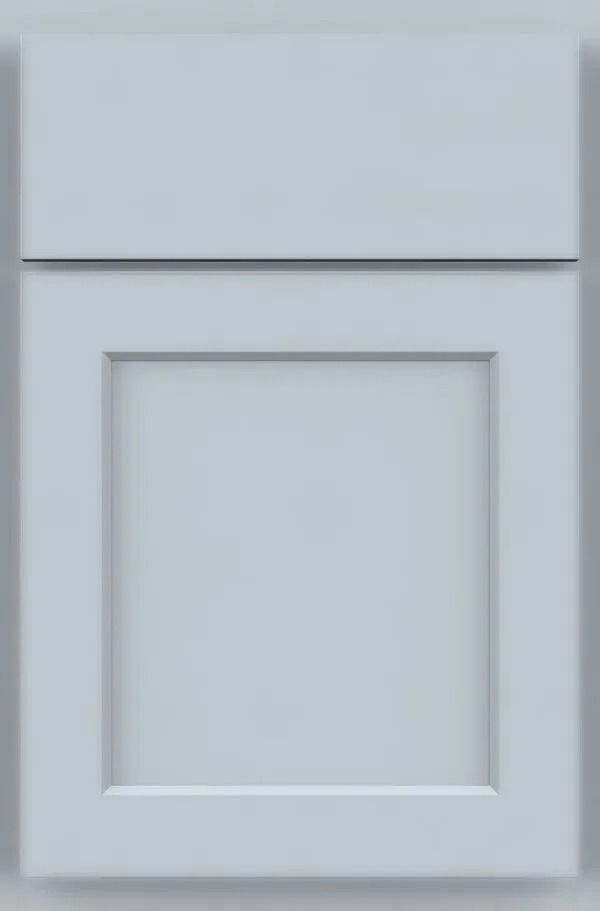 Light blue kitchen cabinet door with a shaker style panel.