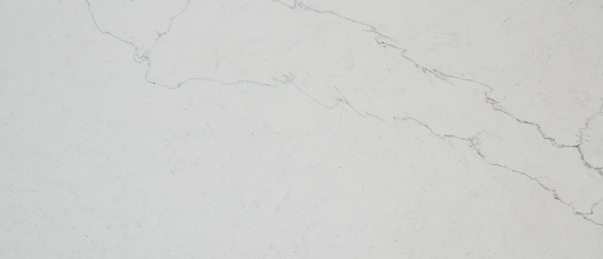White quartz countertop with gray veining.