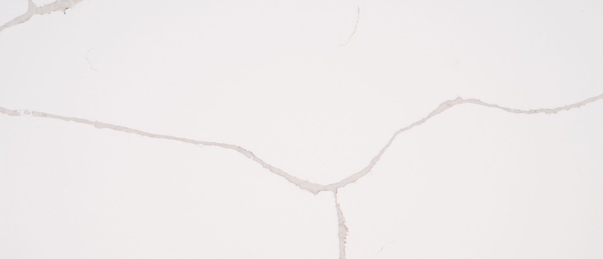 White surface with gray veining.