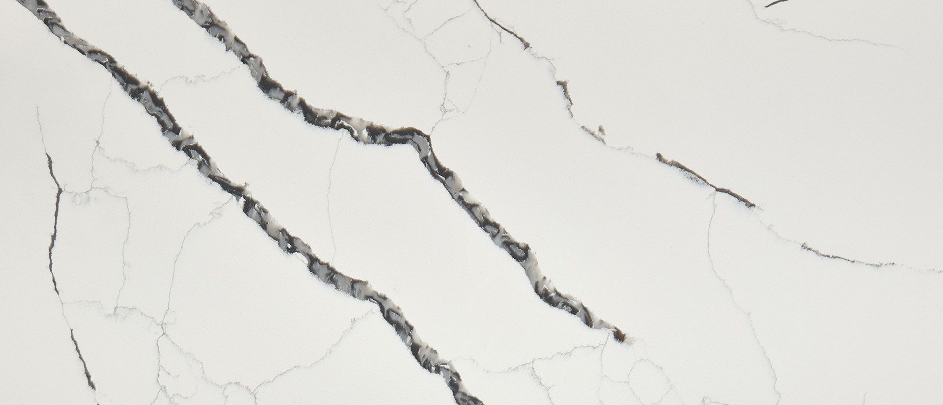 White surface with dark grey veining.