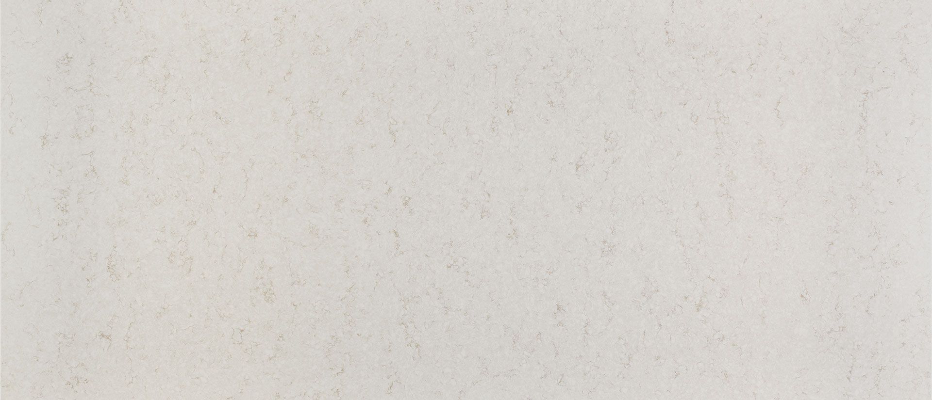 Off-white, textured surface with slight tonal variations and subtle, tiny spots.