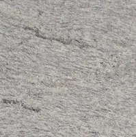 White and gray granite stone surface with a textured pattern.