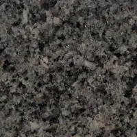 Gray granite countertop with speckled patterns.
