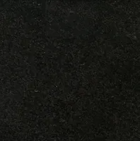 Black speckled surface.