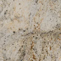 Granite countertop with cream, gold, and black speckles.