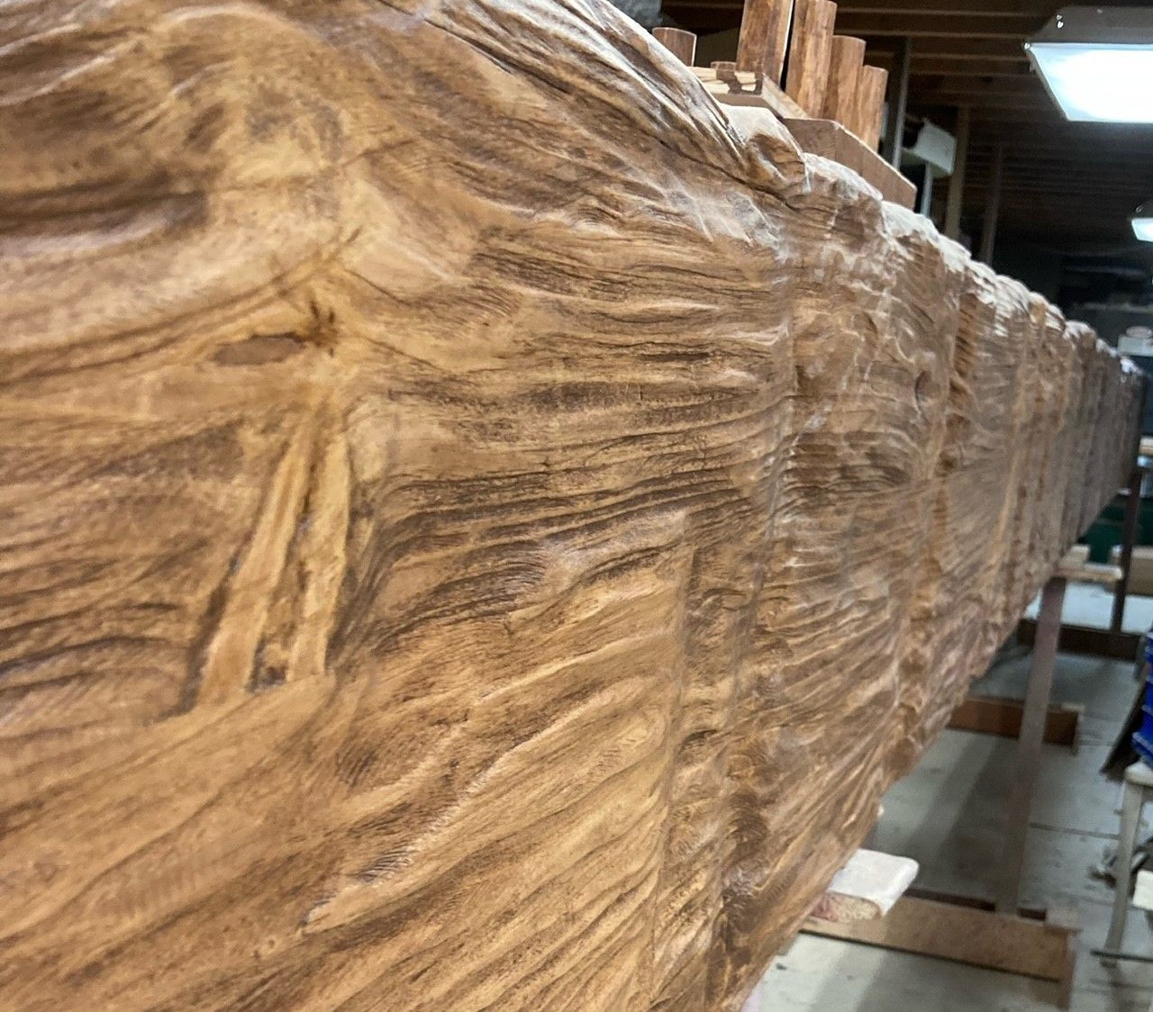 A large piece of wood is sitting on a table