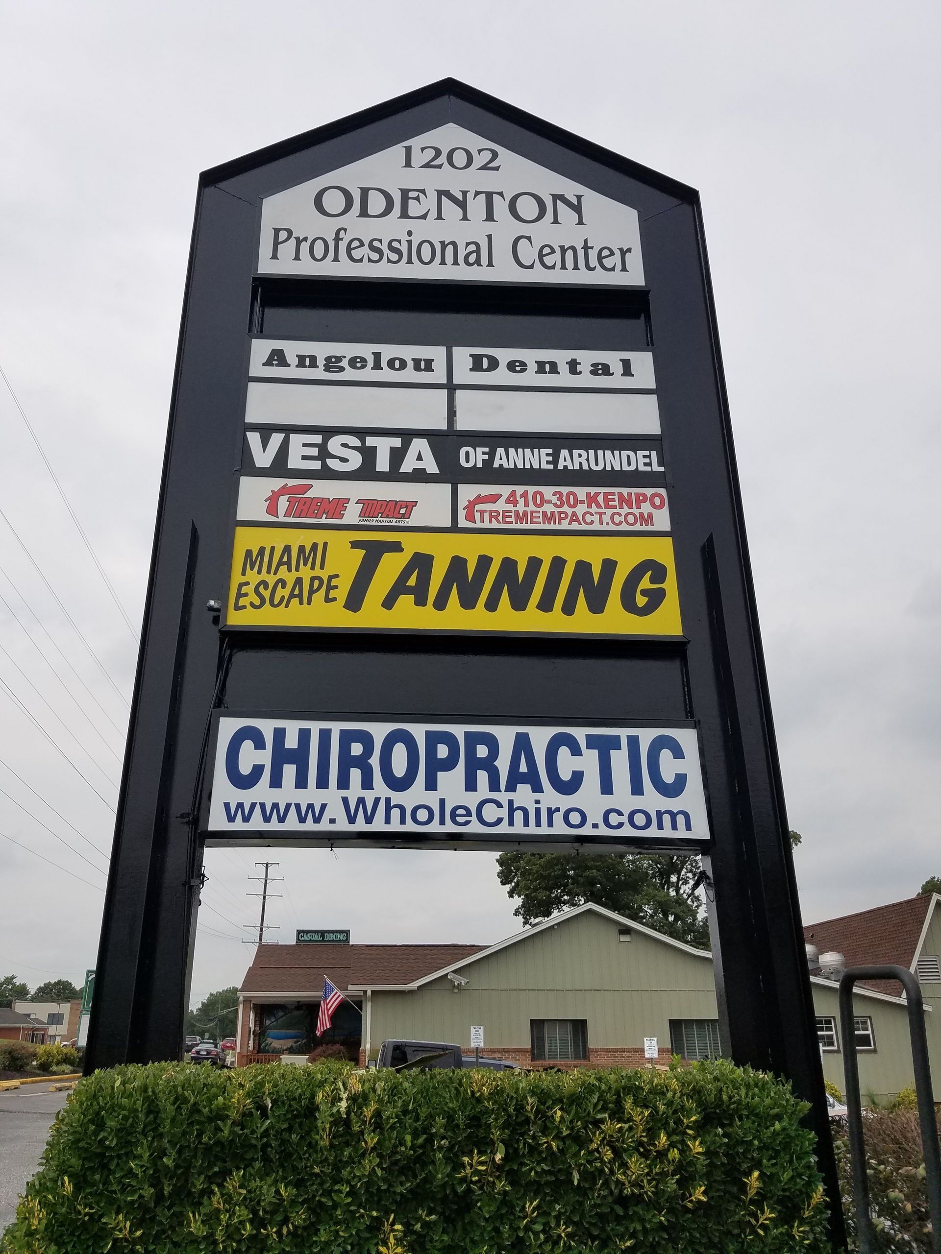 A sign for the odenton professional center