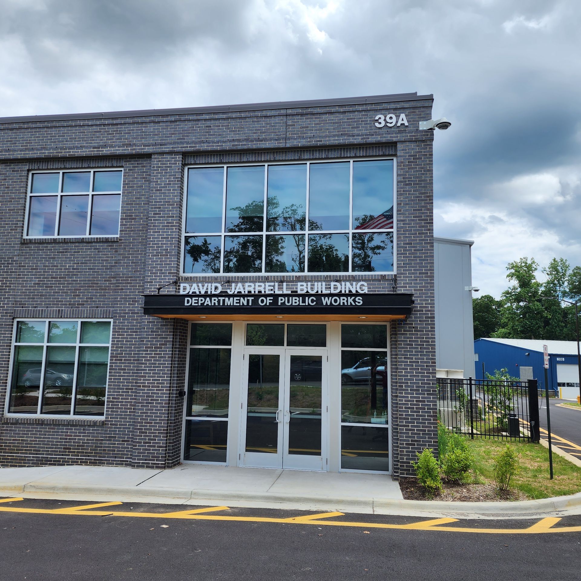 A large brick building with the number 394 on it