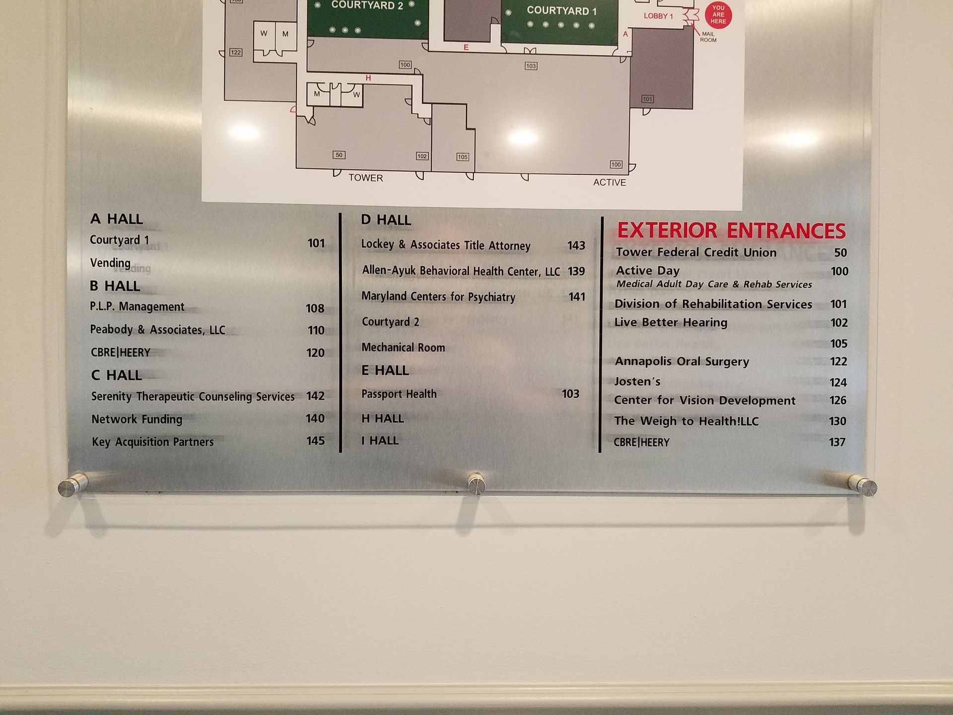 A sign that says exterior entrances on it