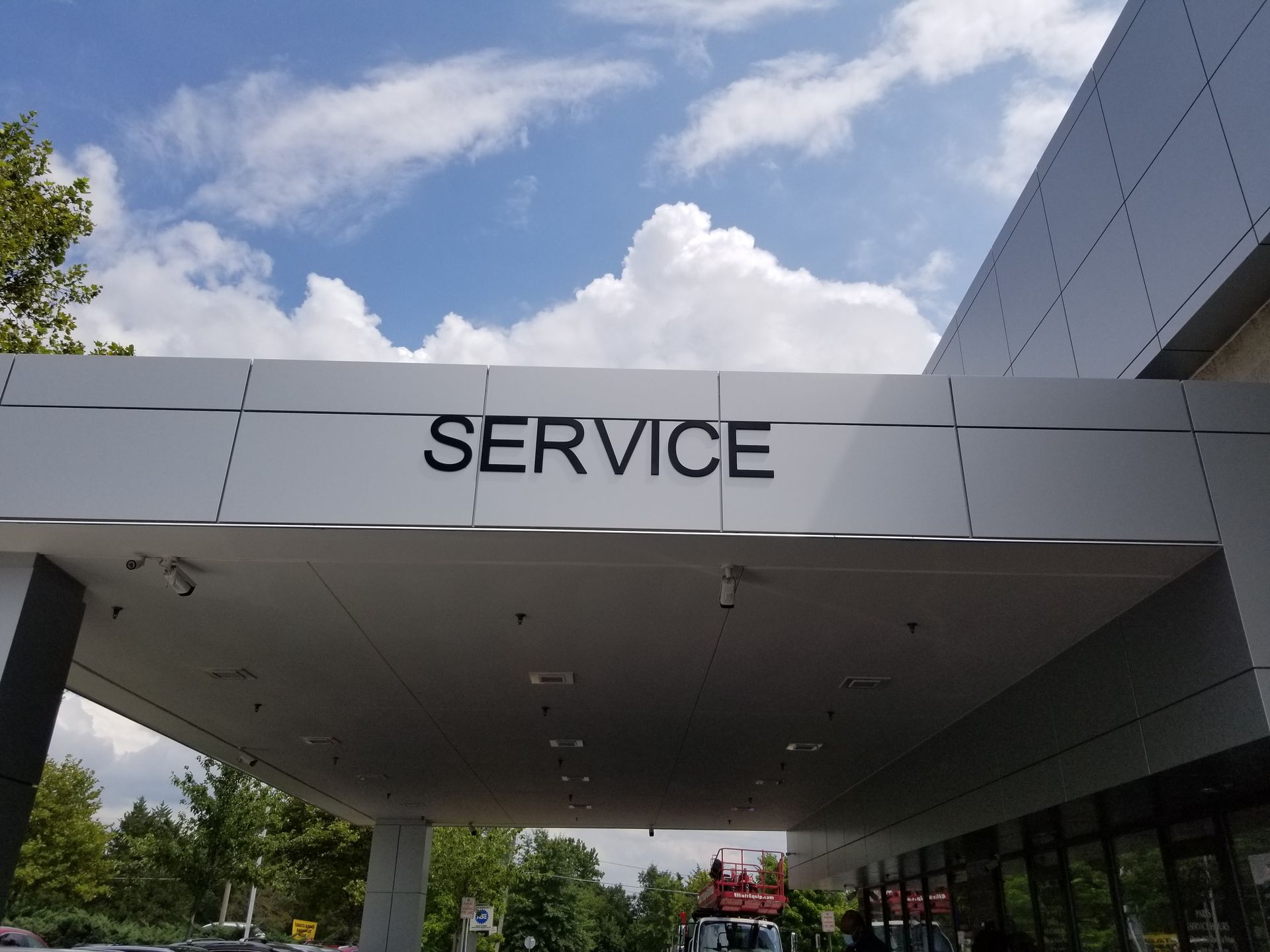The word service is on the side of a building