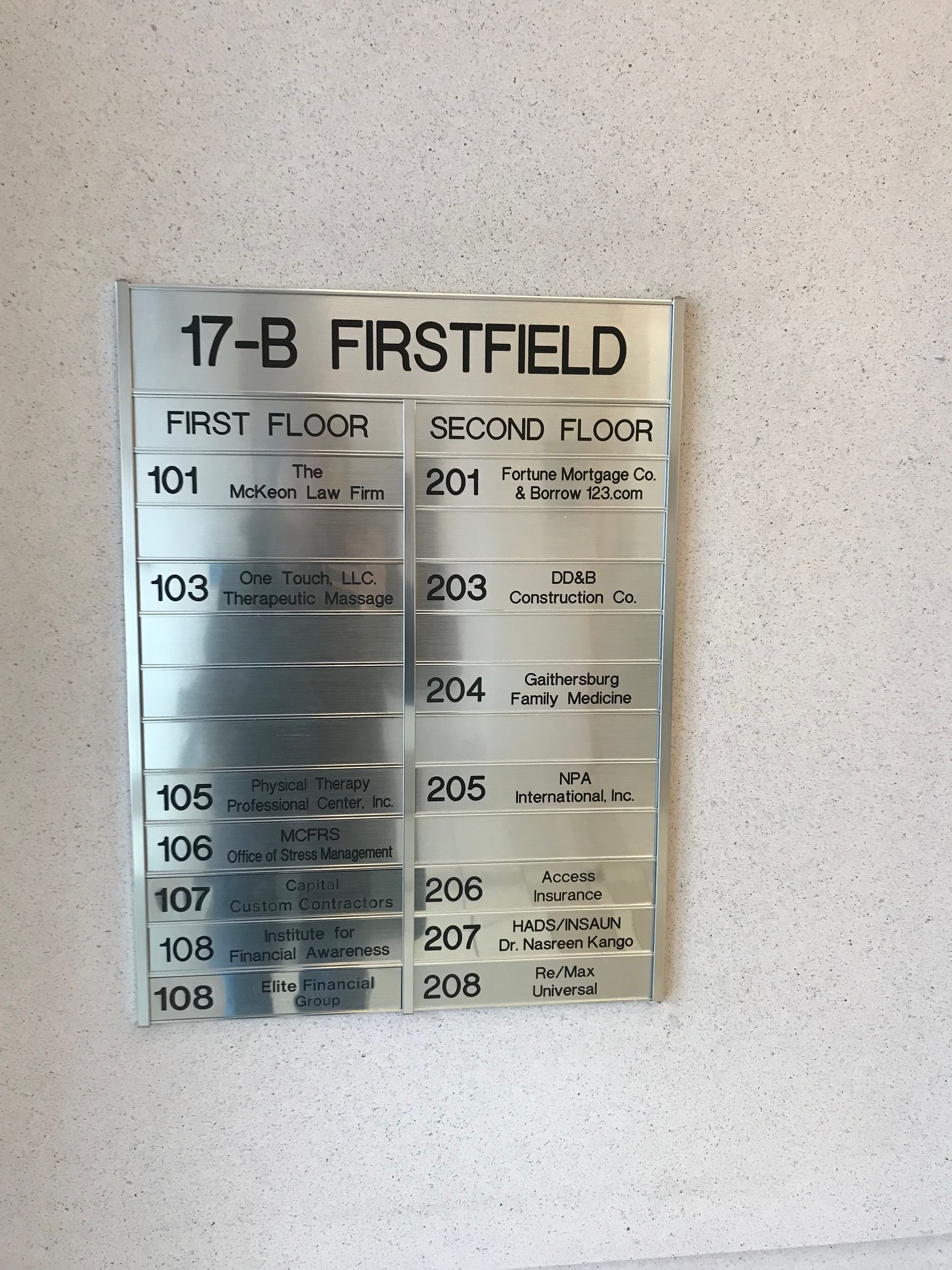A sign on a wall that says 17 b firstfield