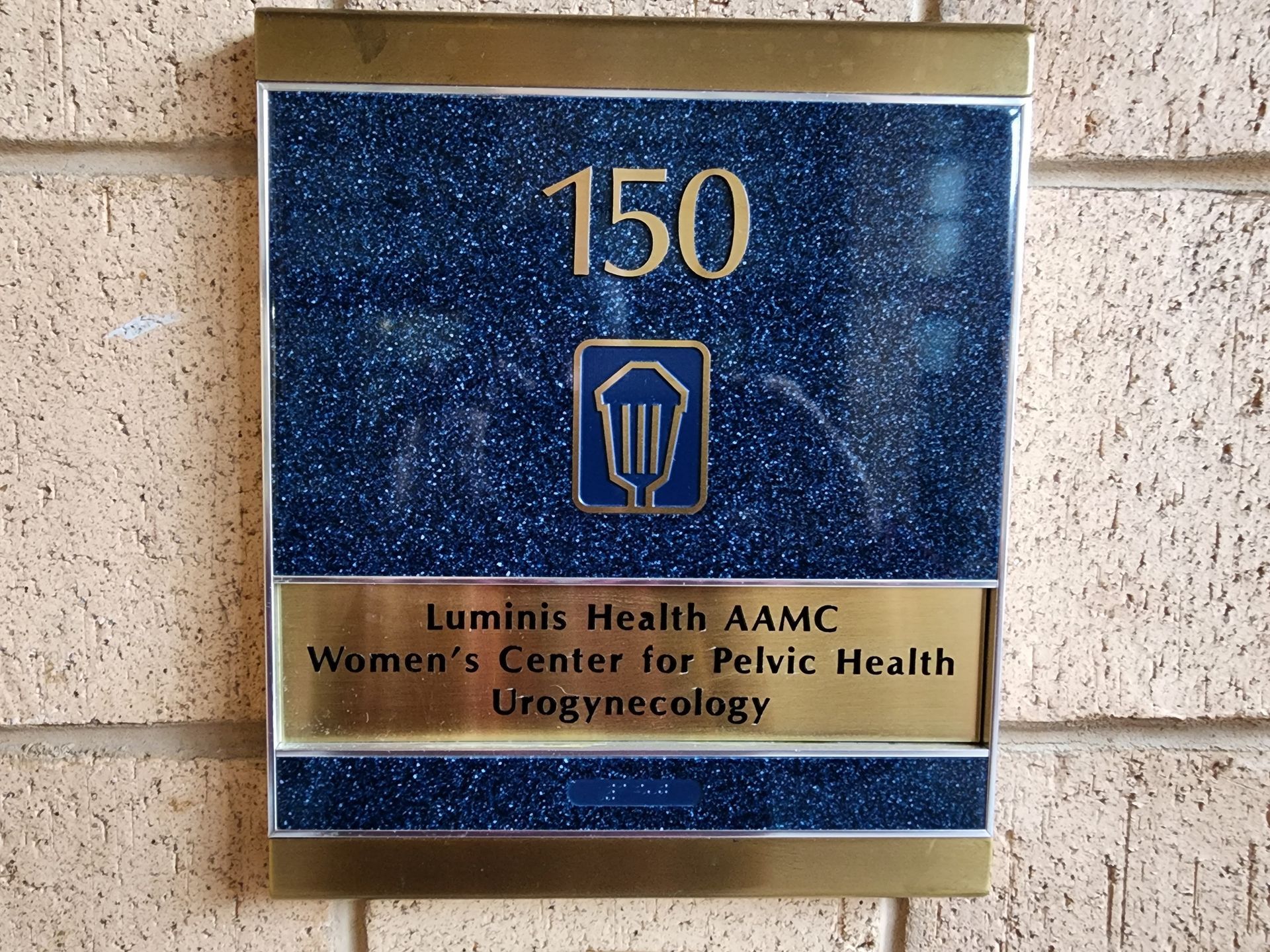 A sign for the luminis health aamc women 's center for pelvic health urogynecology