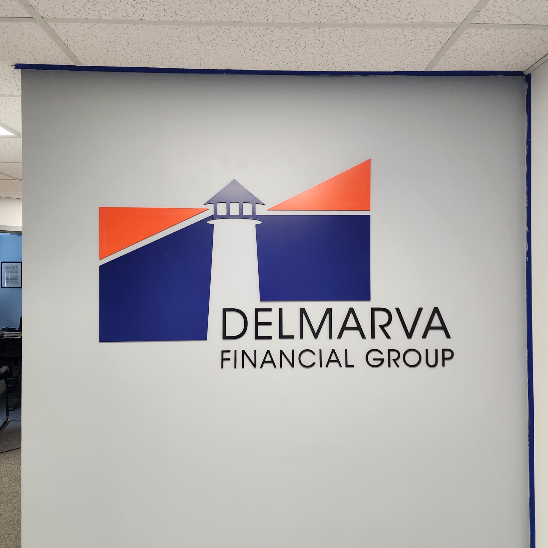 A delmarva financial group logo on a wall