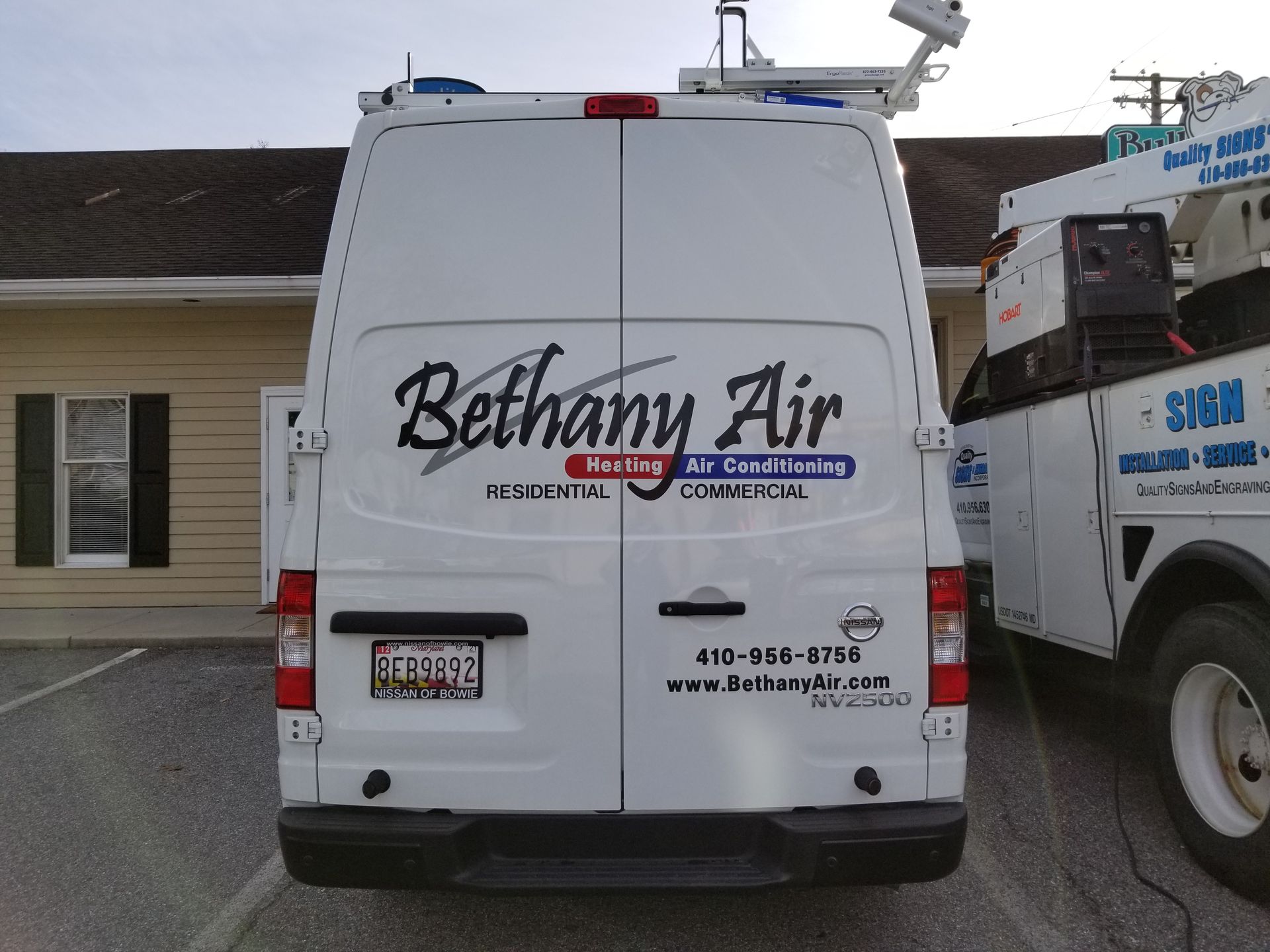 A white van with the word bethany air on it