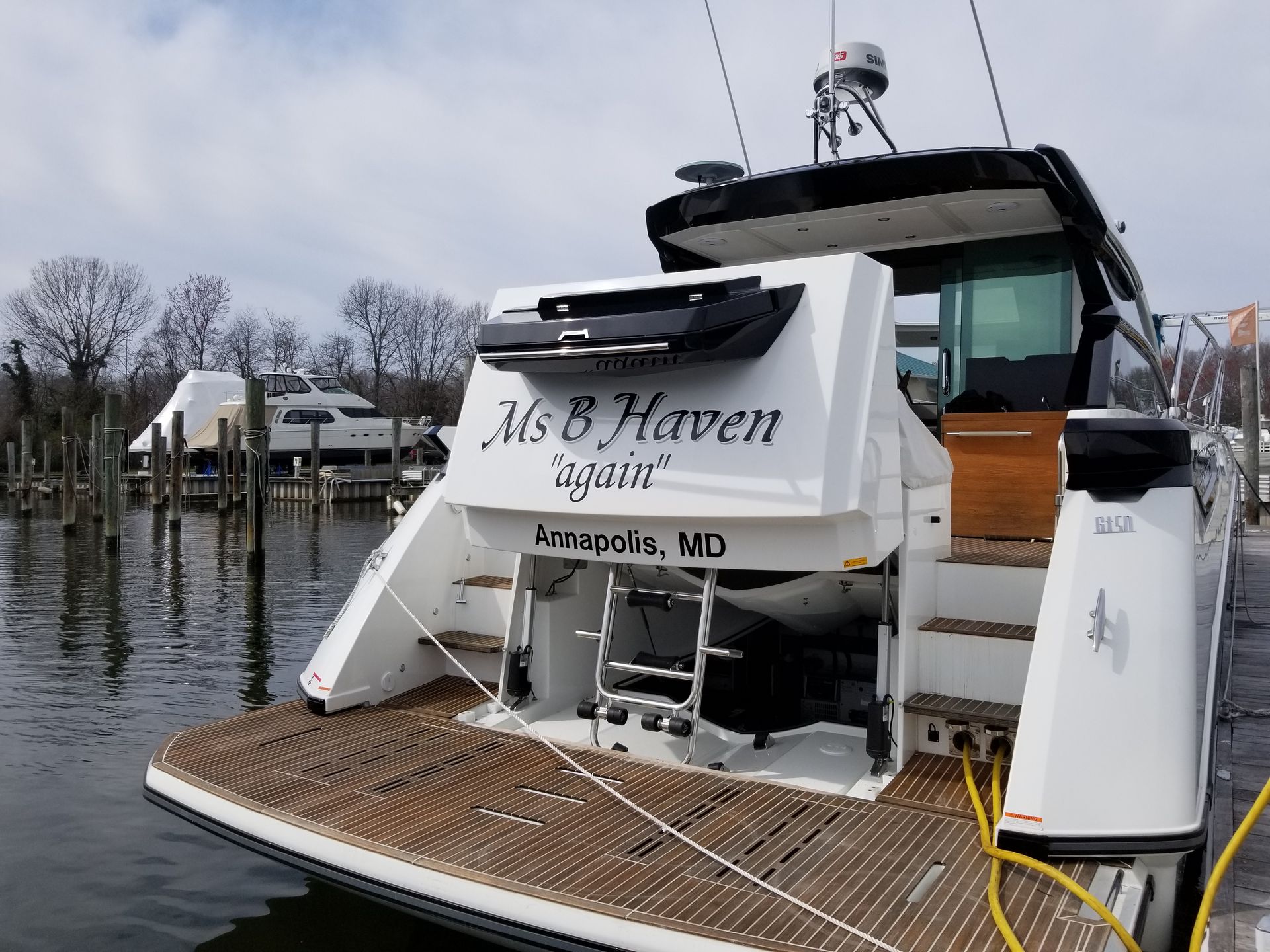 A boat with the name ms 8 haven on the back