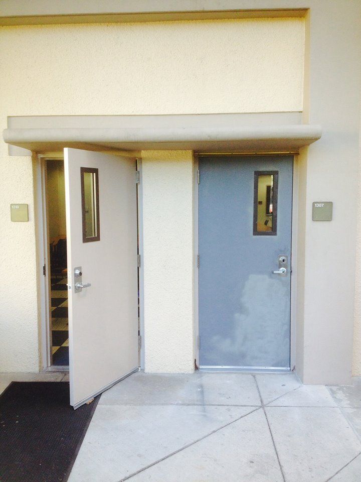 A building with two doors that are open