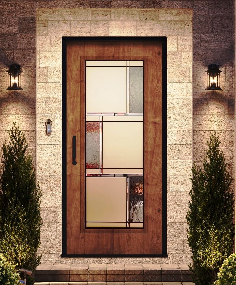 A wooden door with a glass window is on a brick wall.