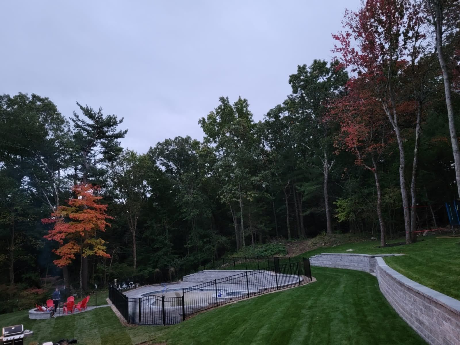 Outdoor fireplace and patio hardscaping