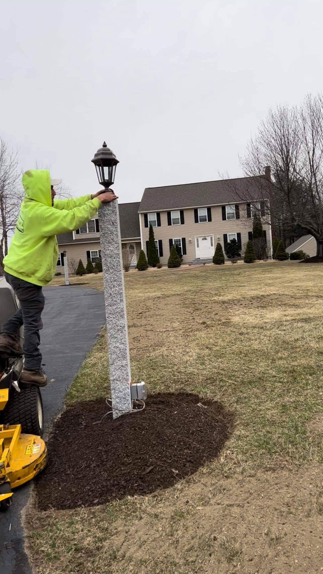 Light post installation along residential driveway