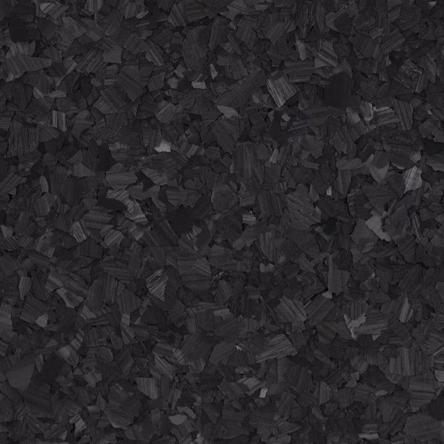 A close-up texture of black rubber flooring with a speckled, multi-faceted pattern.