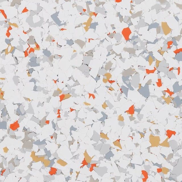 A mottled surface pattern of white, grey, orange, and tan paint chips, typical of an epoxy or decorative floor finish.