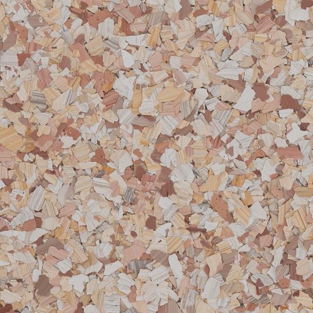 A close-up texture of decorative vinyl floor flakes in shades of beige, tan, cream, and reddish-brown.