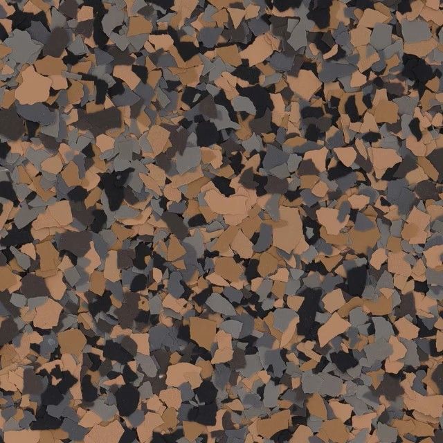 A texture featuring a dense mix of tan, charcoal gray, and black vinyl paint chips, typical of a decorative floor coating.