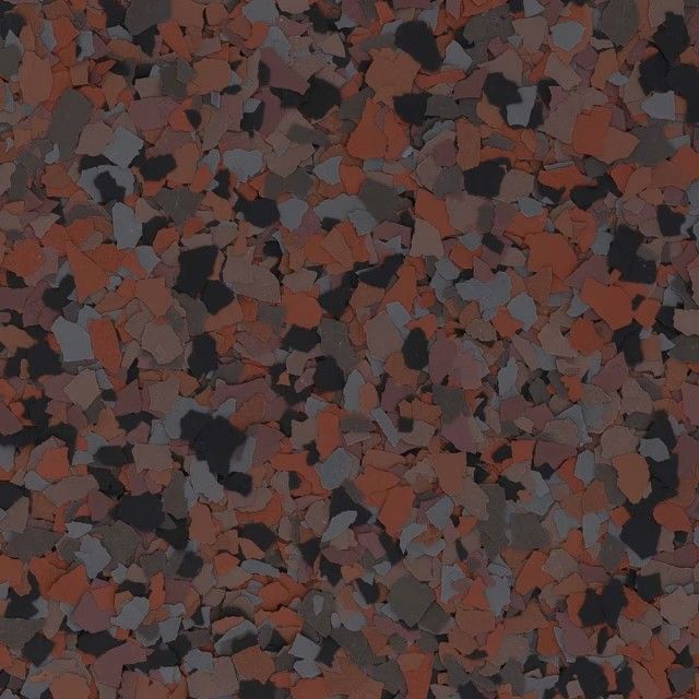 A textured surface with a speckled pattern of rust-red, dark gray, and black chips, commonly used for flooring.