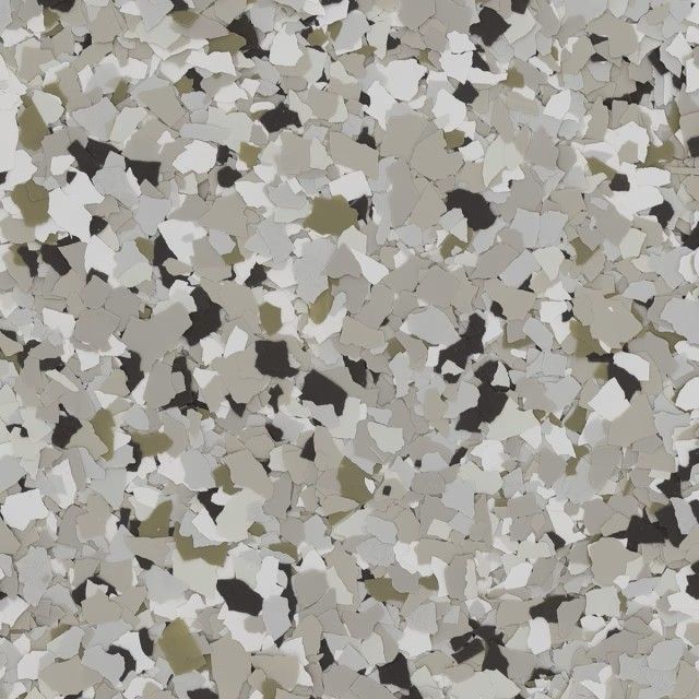A close-up texture of decorative vinyl floor flakes in a mix of grey, beige, white, and black fragments.