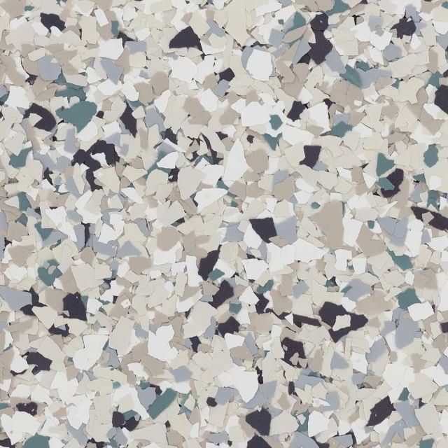 A decorative epoxy floor coating texture featuring a mix of white, grey, black, and muted teal flecks.