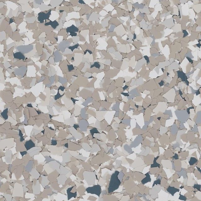A close-up of a decorative flooring finish featuring a dense blend of beige, light gray, white, and dark blue vinyl chips.