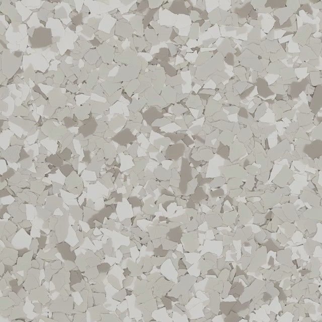 A close-up of a decorative epoxy floor finish featuring a multi-tonal, speckled pattern in shades of beige, gray, and white.
