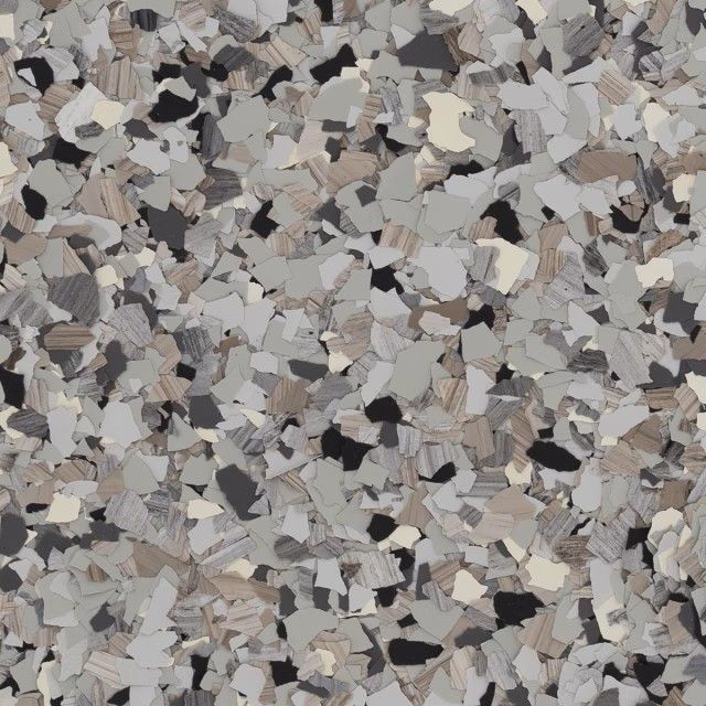 Decorative epoxy flooring texture featuring a multi-colored blend of gray, black, beige, and white vinyl flakes.