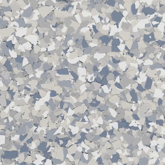 A speckled floor pattern with an even mix of white, light gray, and blue-gray flakes.