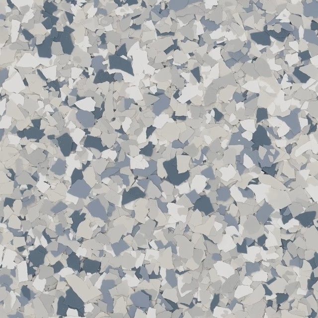A multi-colored floor flake pattern featuring varying shades of gray, white, and navy blue flecks.