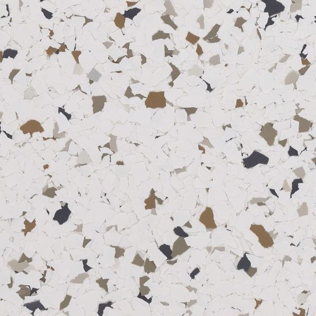 A seamless floor texture featuring a white base with scattered black, tan, and gray vinyl flakes.