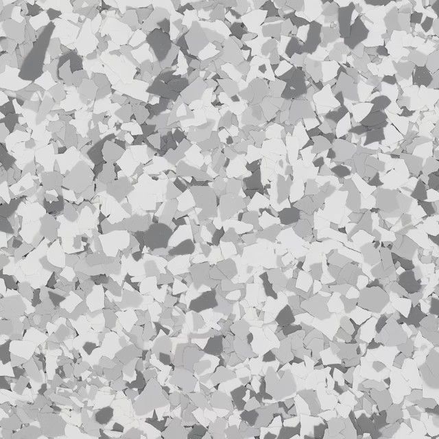 A textured pattern of multi-sized, overlapping chips in shades of light, medium, and dark gray.