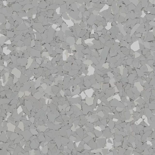 A textured, mottled surface featuring a mix of light, medium, and dark grey stone-like flecks.
