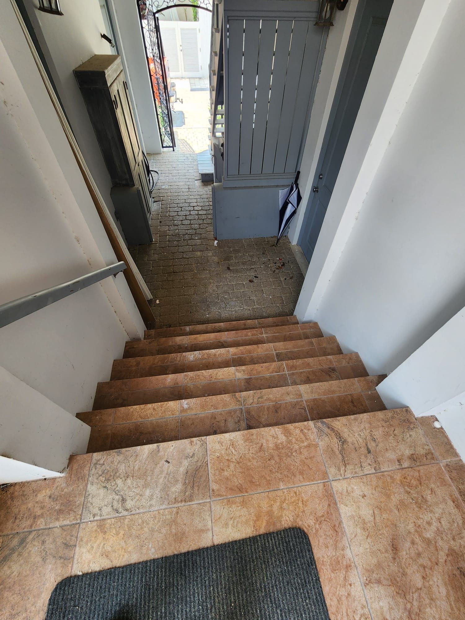 a set of stairs leading up to a doorway in a building