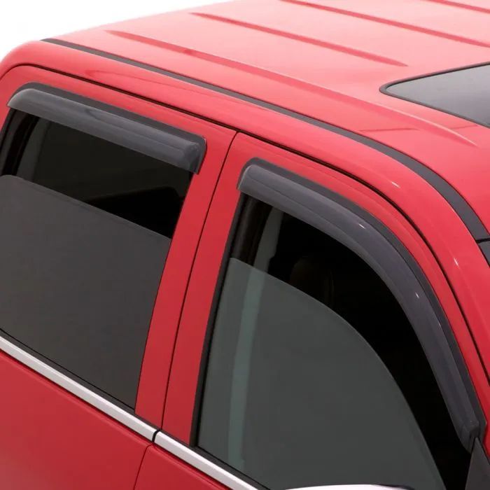 Red truck with black window visors.
