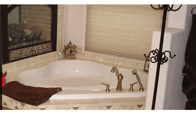 bathroom with faucet and brown towel