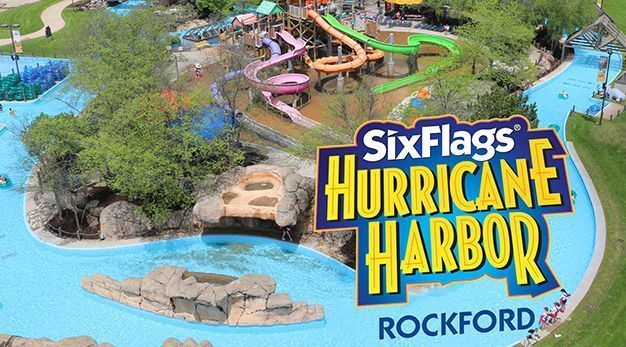 Six Flags Hurricane Harbor Rockford waterpark aerial view with slides and lazy river.