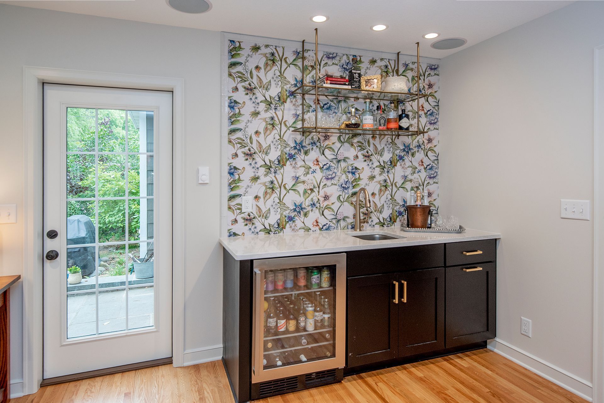 Small bar area with dark cabinets