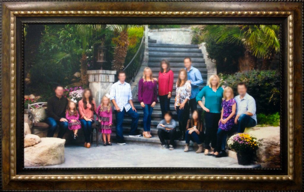 Large family portrait with stacked frames