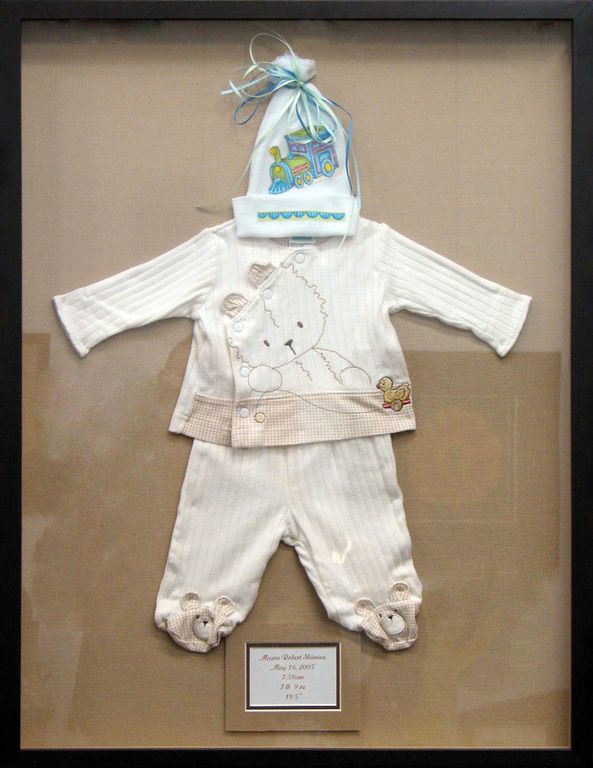 Baby clothes memorabilia frame