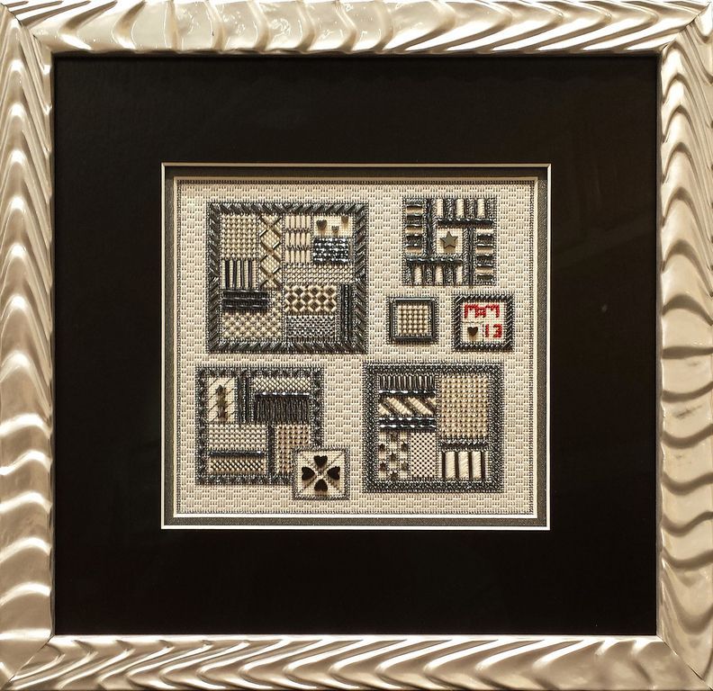 Counted cross stitch framed